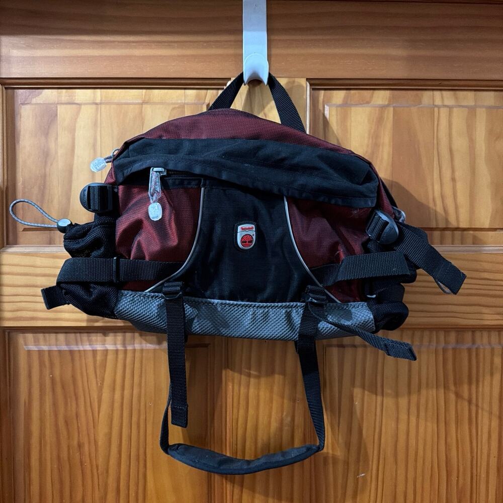 Red and black Timberland Fanny pack with multiple compartments